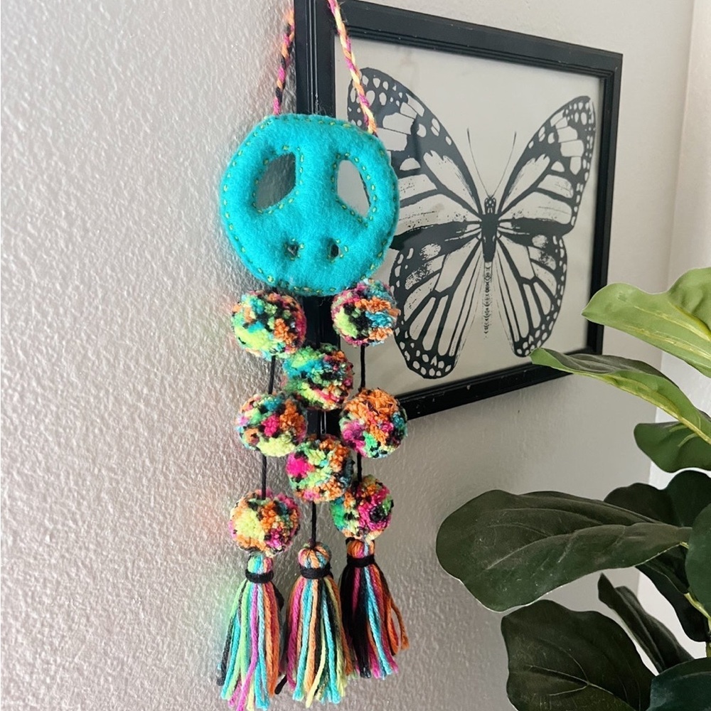 Peace sign wall hanging
